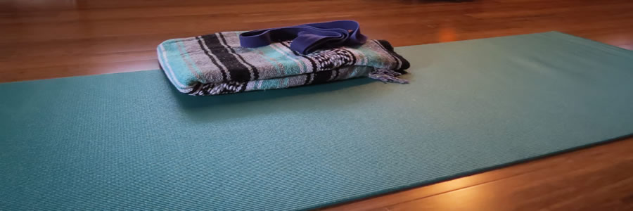 Yoga mat with provided materials